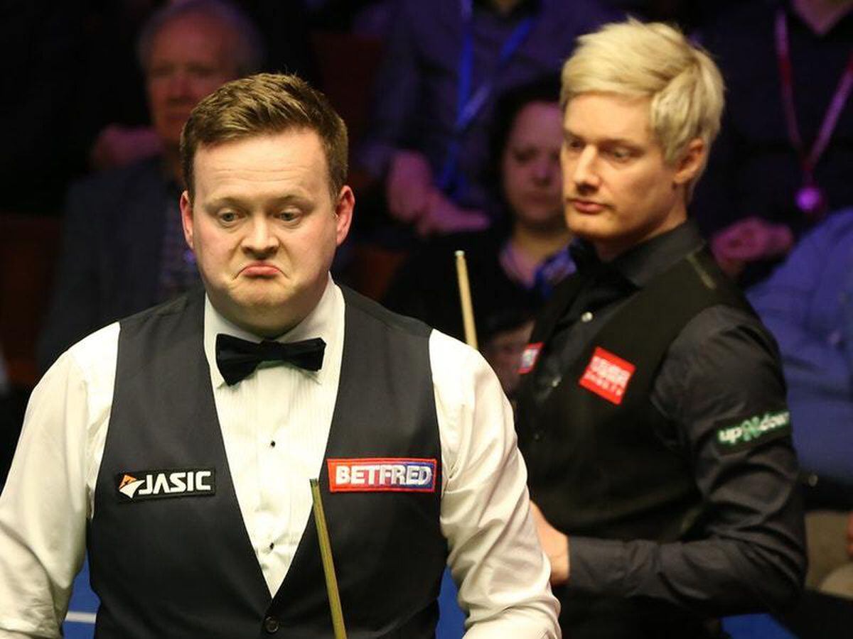 Shaun Murphy (left) and Neil Robertson during day seven of the 2019 Betfred World Championship at The Crucible, Sheffield