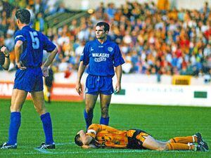 Steve Bull appears to come of the worse after this Molineux clash