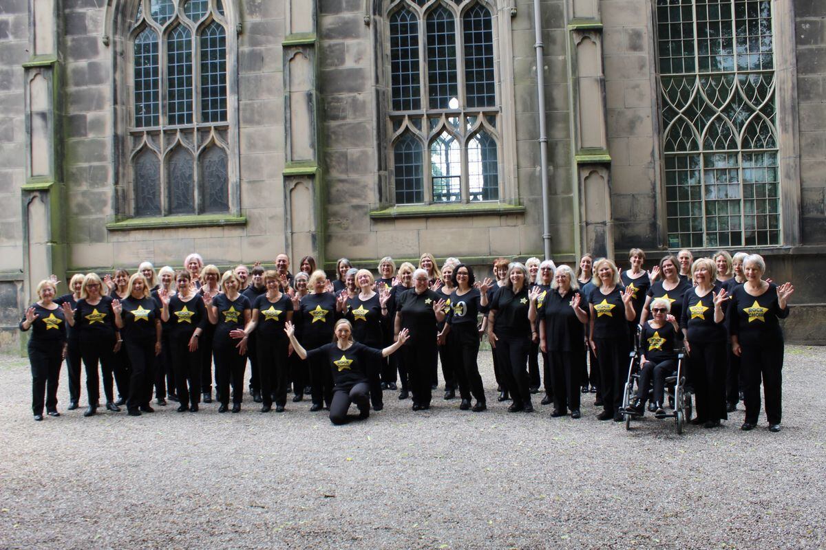 The choir outside St Alkmunds  