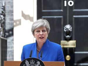 Prime Minister Theresa May makes a  statement in Downing Street