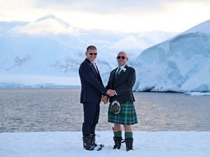 Eric Bourne and Stephen Carpenter celebrating in the British Antarctic Territory