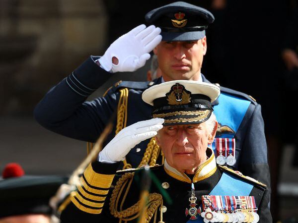 King Charles III and the Prince of Wales salute at the State Funeral of Queen Elizabeth II