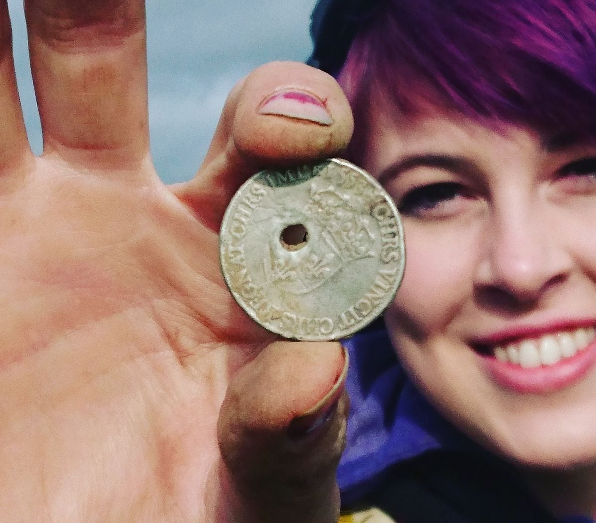Jocelyn Elizabeth with the pierce French coin