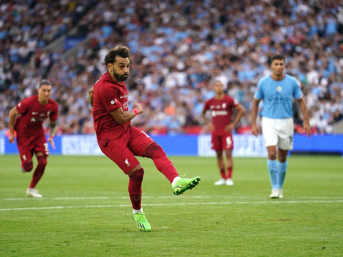 Liverpool’s Mohamed Salah scores a penalty