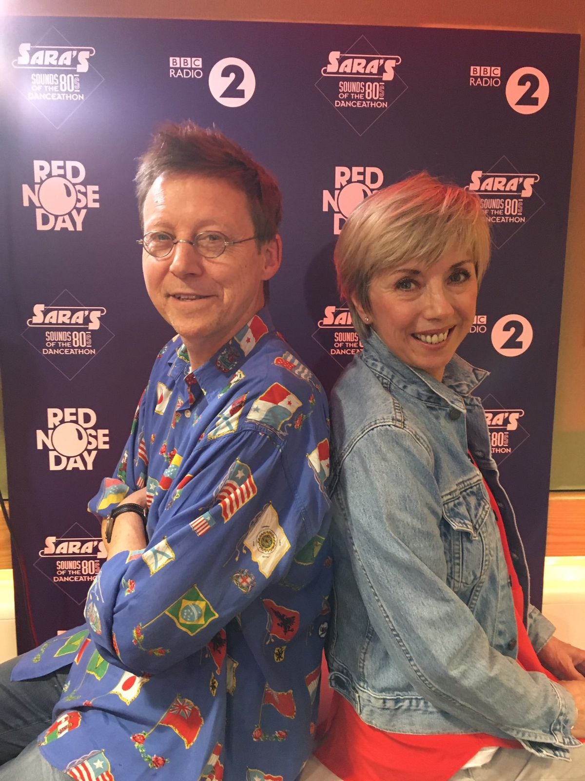 Back together – Simon Mayo and Sybil Ruscoe recreate their 1980s pose during a reunion organised for Red Nose Day