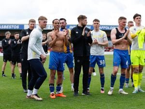 Shrewsbury Town players applaud the fans at full time at Lincoln (AMA)
