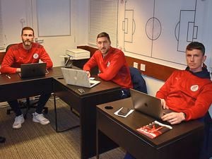 From Molineux to management: Roger Johnson, Stephen Ward and Kevin Foley together in their portable office at Brackley Town.