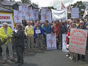 File photo of a wind farm protest at Cefn Goch Inn below Mynydd Clogau. Naturalist David Bellamy (left) with Mid Wales anti-windfarm campaigners at their protest at Cefn Coch. 