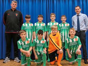 Ludlow Town Colts manager and PE coach Will Tisdale with team members, back row, Joshua Smart-Lynch, George Lynch, William Beasley and Finley Smart. Front, Riley Hughes, Oscar Crippin, Sabyan Hands and Lewis Sampson 