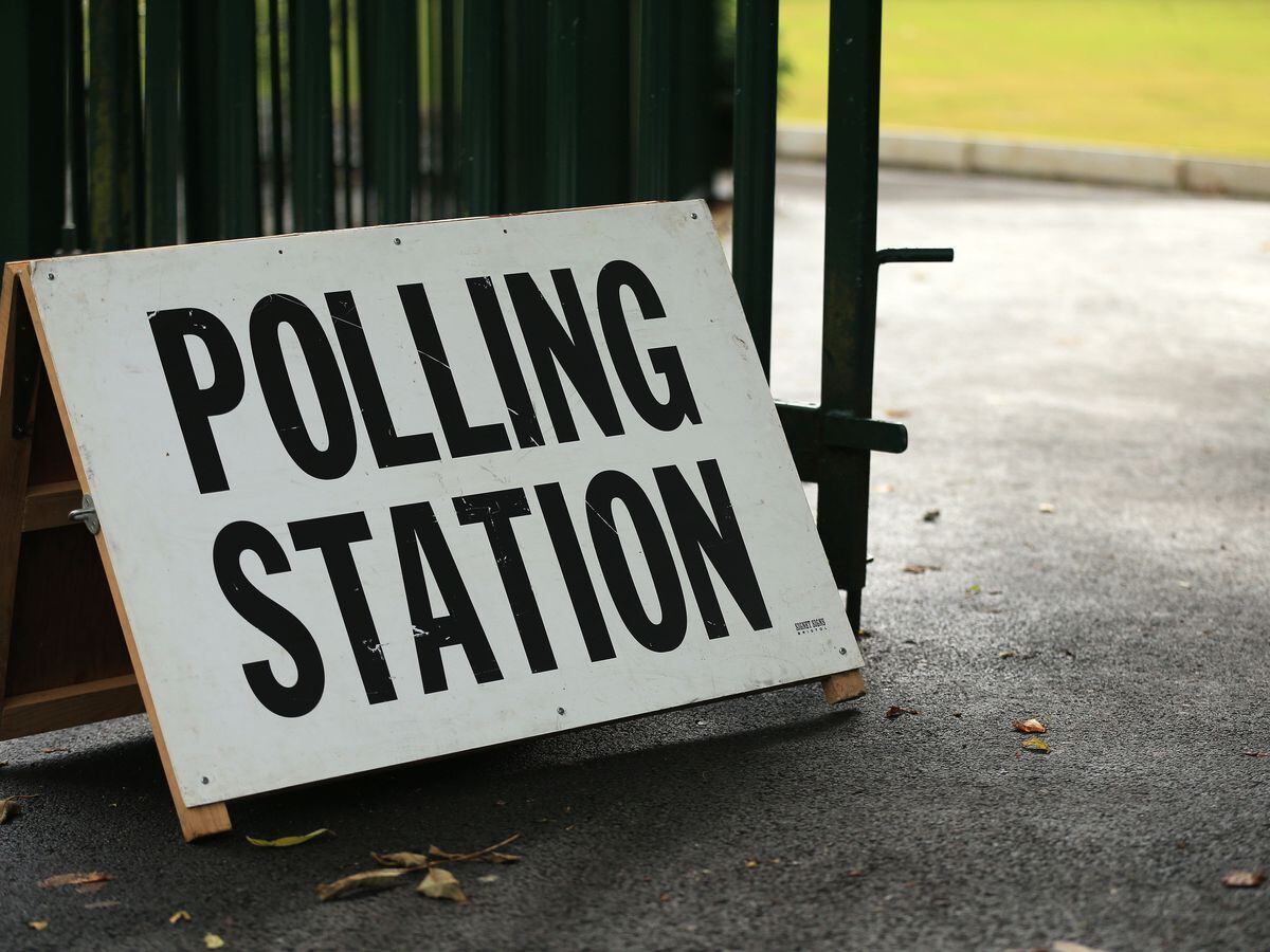 A polling station sign (Lynne Cameron/PA)
