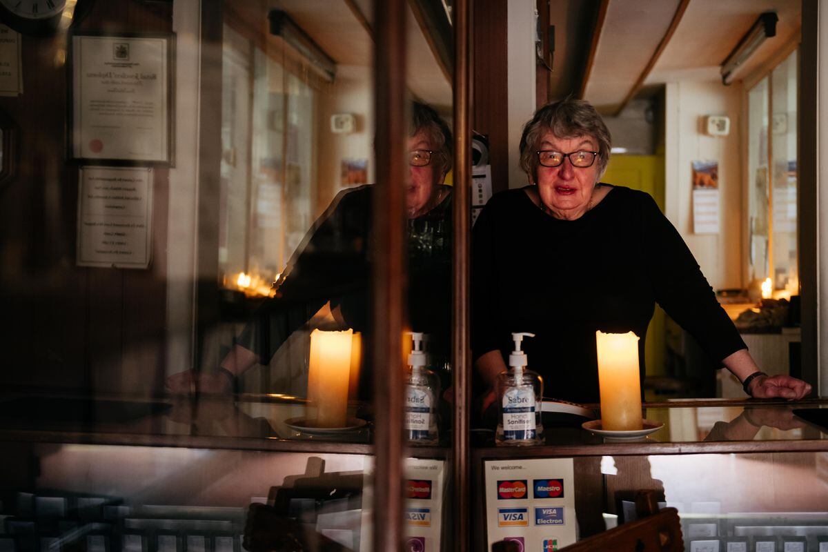 June Williams of RJ Christian Jewellers, who were without power and working by candlelight