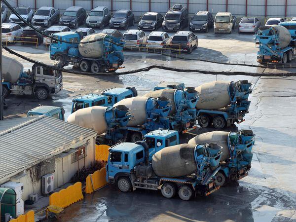 Ready-mixed-concrete vehicles are parked at a remicon plant in Seoul