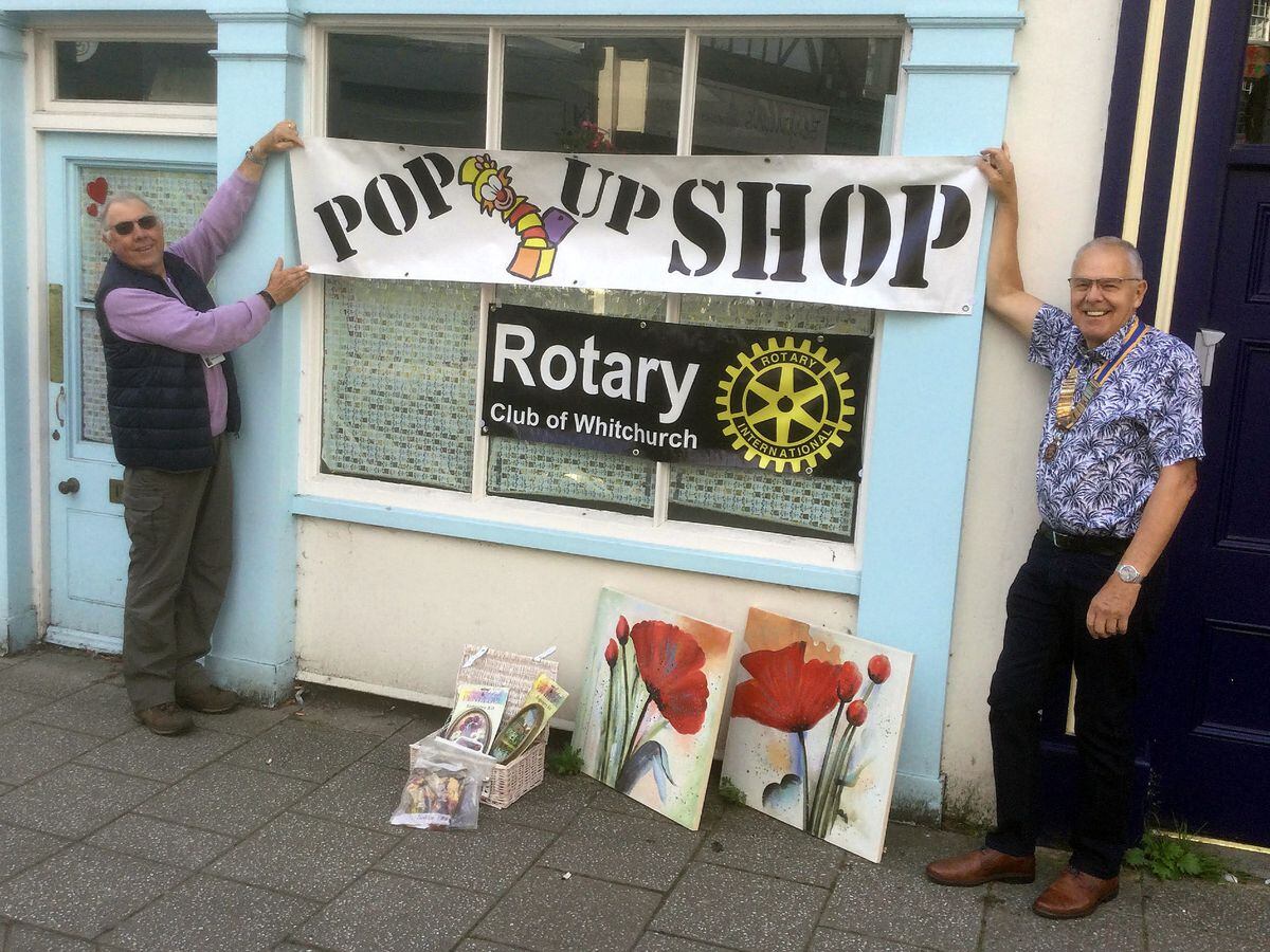 Whitchurch Rotary Club president Dave Simcock (right) and vice president Steve Chisholm prepare a ‘pop-up’ shop
