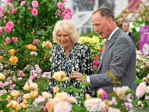 Queen Camilla with David Austin during a visit to the RHS Chelsea Flower, at the Royal Hospital Chelsea, London
