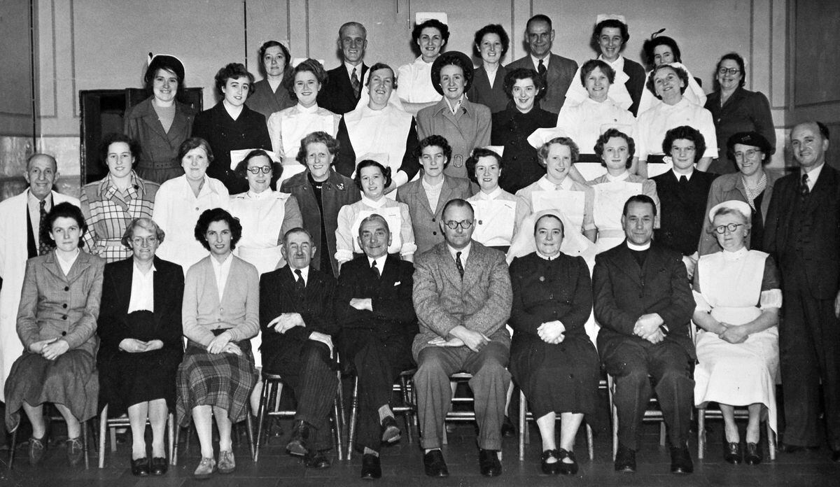 This is "Morda workhouse, 1956." These are clearly the members of staff. The building on the edge of Oswestry was burned down in an arson attack in February 1982.