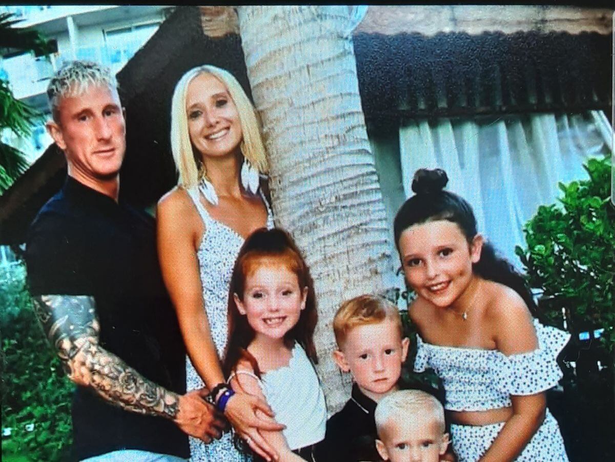 Shane Evans and his children and partner, Lisa