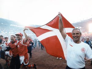 FILE - In this June 26, 1992 file photo, Richard Moller-Nielsen celebrates Denmark winning the European Soccer Championships, at Nya Ullevi Stadion, in Gothenburg, Sweden.  Richard Moller Nielsen, who led the Danish football team to its first major title in 1992 and later coached Finland and Israel, has died, it was reported on Thursday, Feb. 13, 2014. He was 76. (AP Photo/Polfoto, Kim Agersten, File) DENMARK OUT.