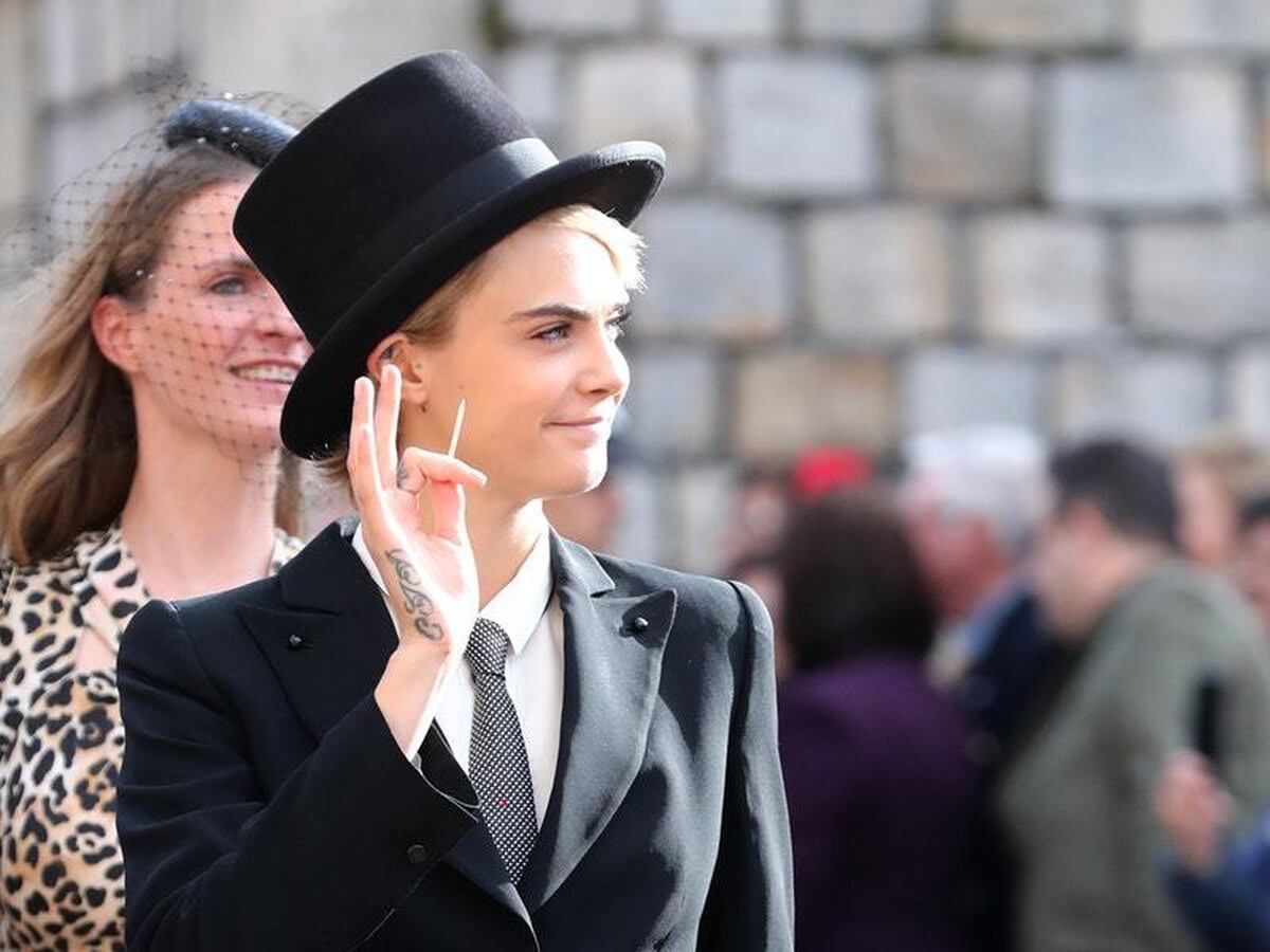 Cara Delevingne wears bold top hat and tails to the royal ...