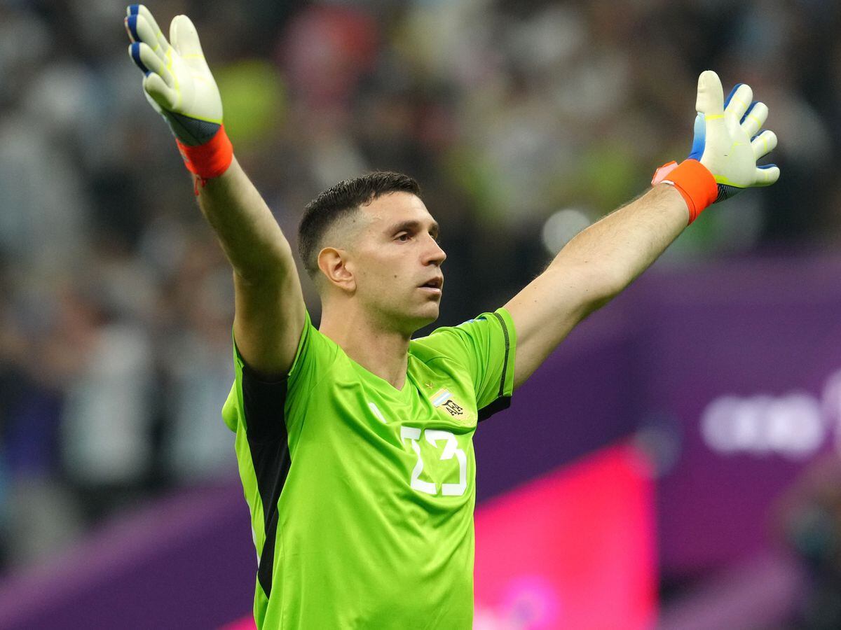 Emiliano Martinez celebrates Argentina’s first goal against Croatia