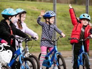 Youngsters taking part in a children's cycling training session with Instructor Nick Jenko.