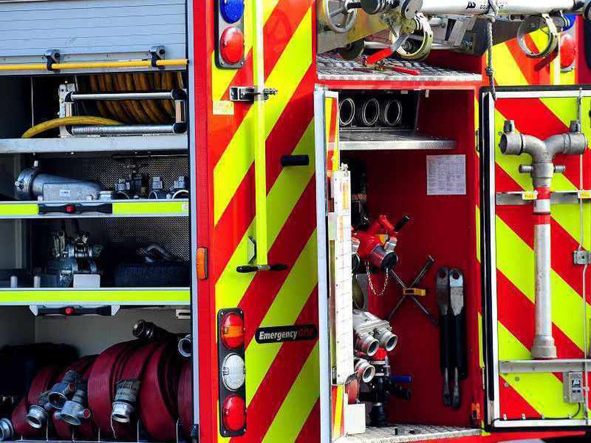 Firefighters were scrambled after an unattended fire pit got out of control and set fire to a shed in Donnington