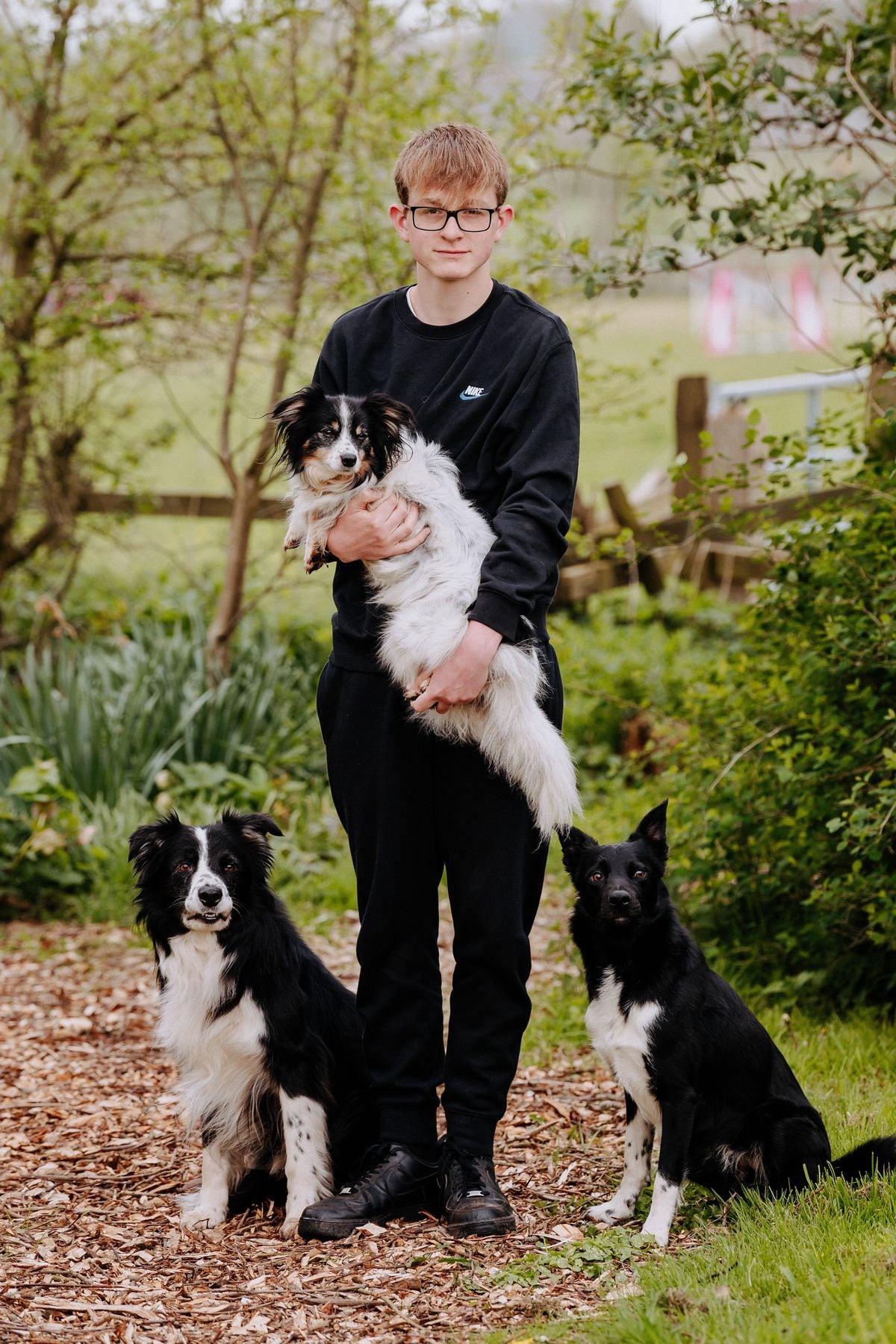 Max Glover and his three dogs, Boost, Woody and Beat