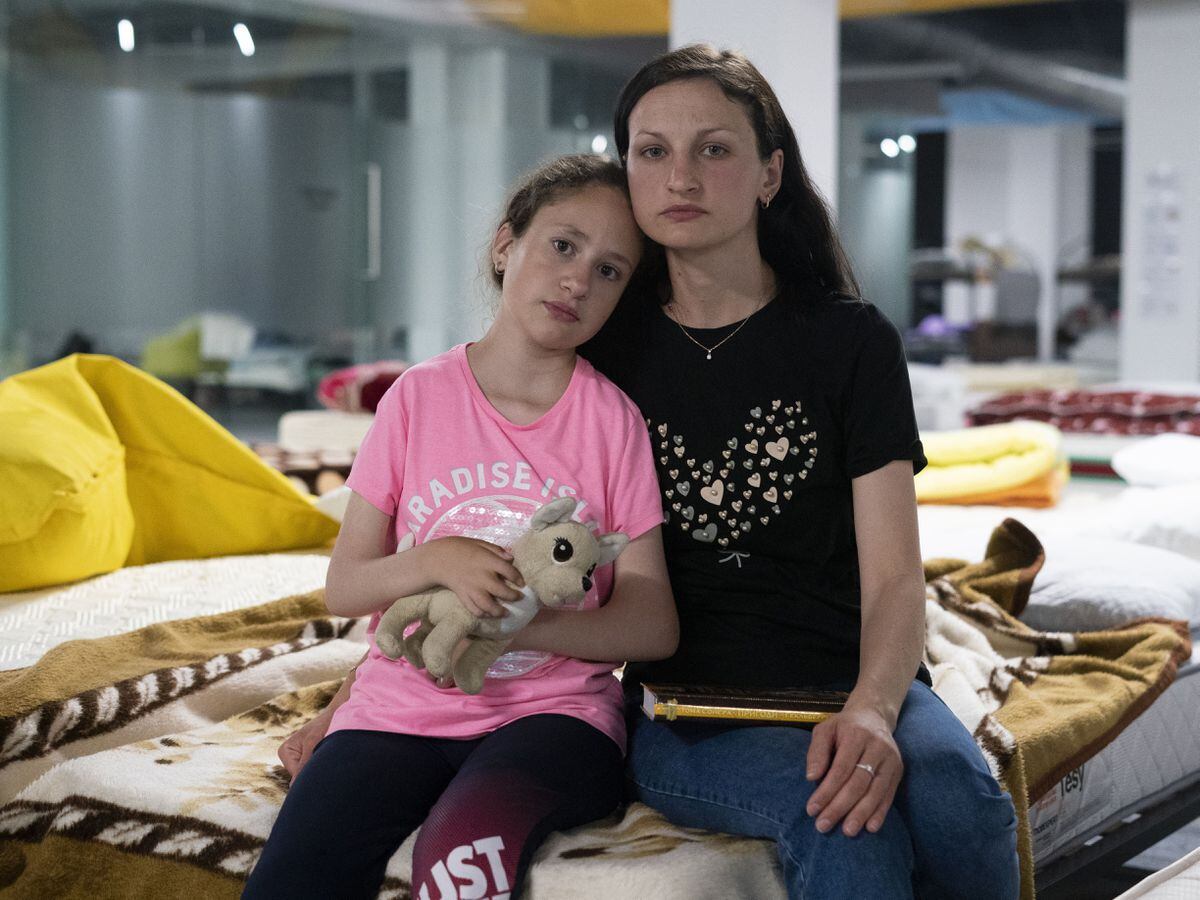 Ukrainian refugee Elena Boyko, 30, and her daughter Viktoria Boyko, (Kirsty O'Connor/PA)