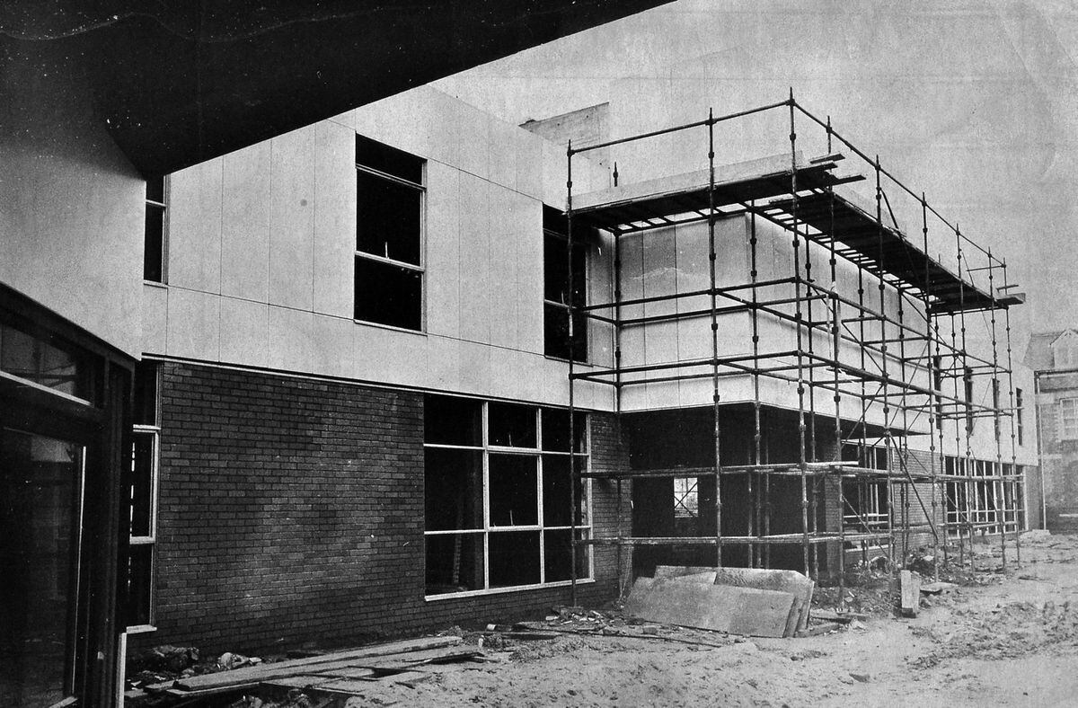 The magistrates court, library and health centre complex being built in Cheshire Street in 1972nostalgia pic. Market Drayton. The caption pasted on the back of this print in the Shropshire Star picture archive reads: 'The new magistrates court, library and health centre complex which is now taking shape in Cheshire Street, Market Drayton.' Date on the caption is 30.12.72, i.e. December 30, 1972, which will be publication date. The photographer was Richard Brock and the print has the Shropshire Star copyright stamp. Library code: Market Drayton nostalgia 2014.
