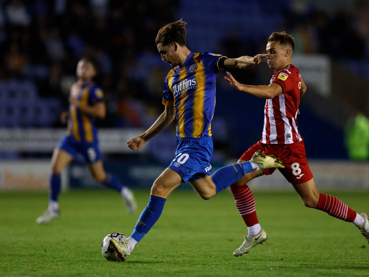 Tom Bayliss of Shrewsbury Town and Archie Collins of Exeter City (AMA)