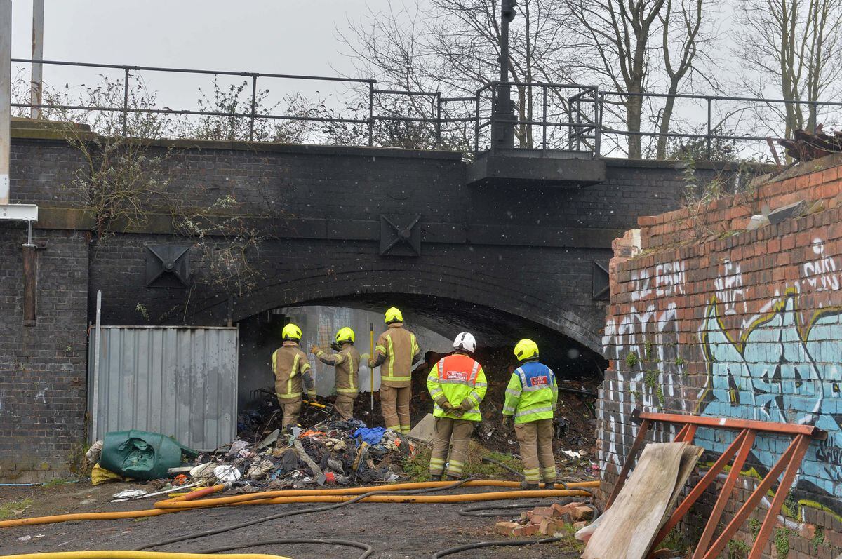 Fire crews at the scene of the caravan and rubbish blaze at Lower Horseley Fields, Wolverhampton
