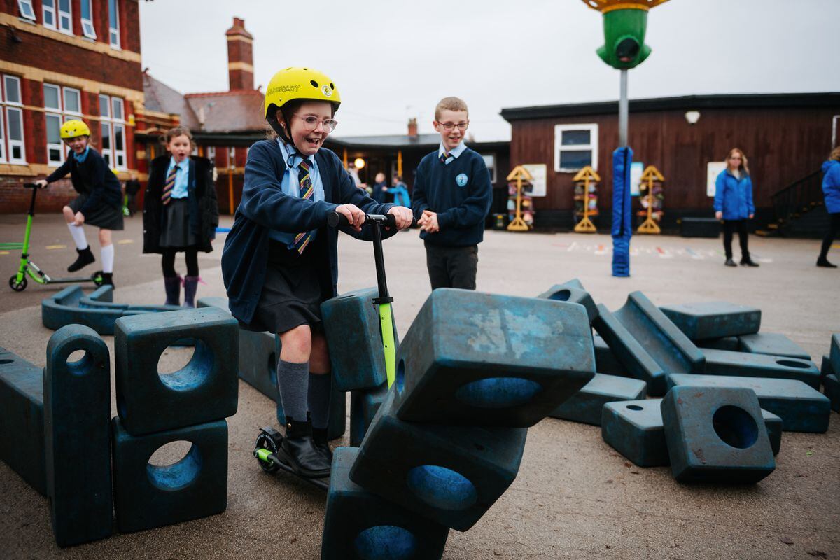 Children enjoy the outdoor fun and learn new skills despite the weather