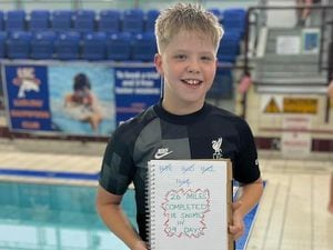 Callen Gill, aged 10, has swum 26 miles over 29 days