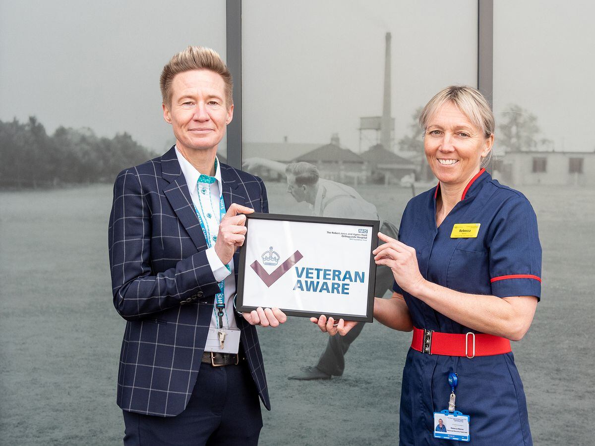 Stacey Keegan, Chief Executive, and Rebecca Warren, Nurse and Staff Reservist, celebrating after the Trust was re-awarded Veteran Aware status. 