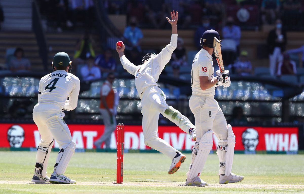 Australia's Marnus Labuschagne attempts to catch England's Chris Woakes 