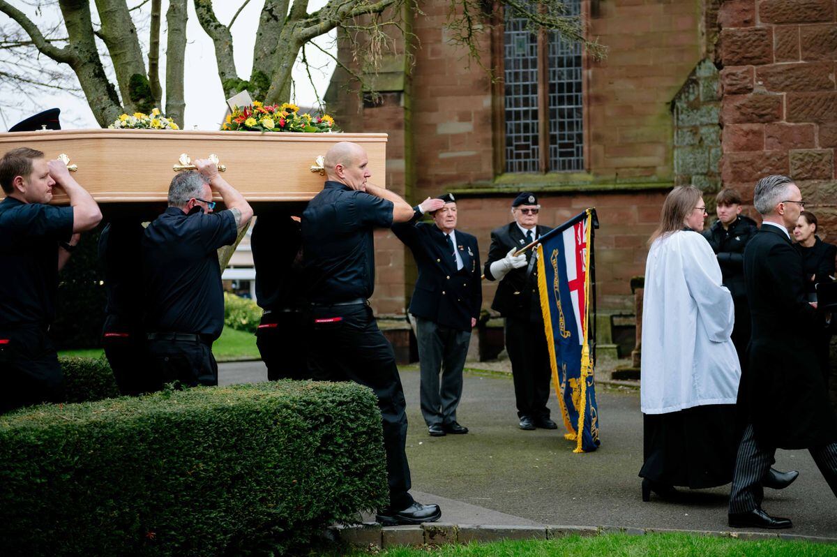 Firefighters carried Shane's coffin into the church