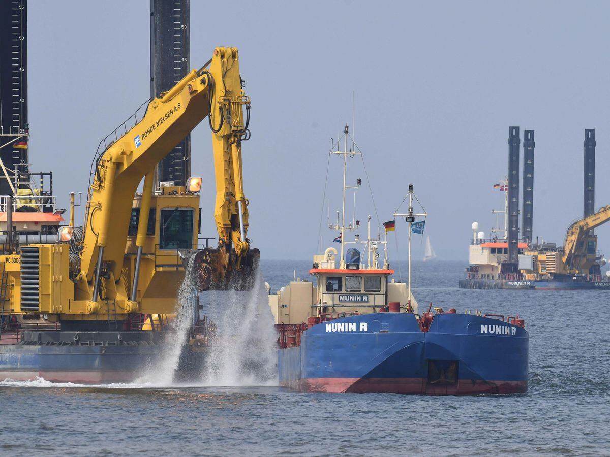 Excavators working on a discharge channel of the new Nord Stream 2 Baltic Sea pipeline in the Bay of Greifswald in 2018