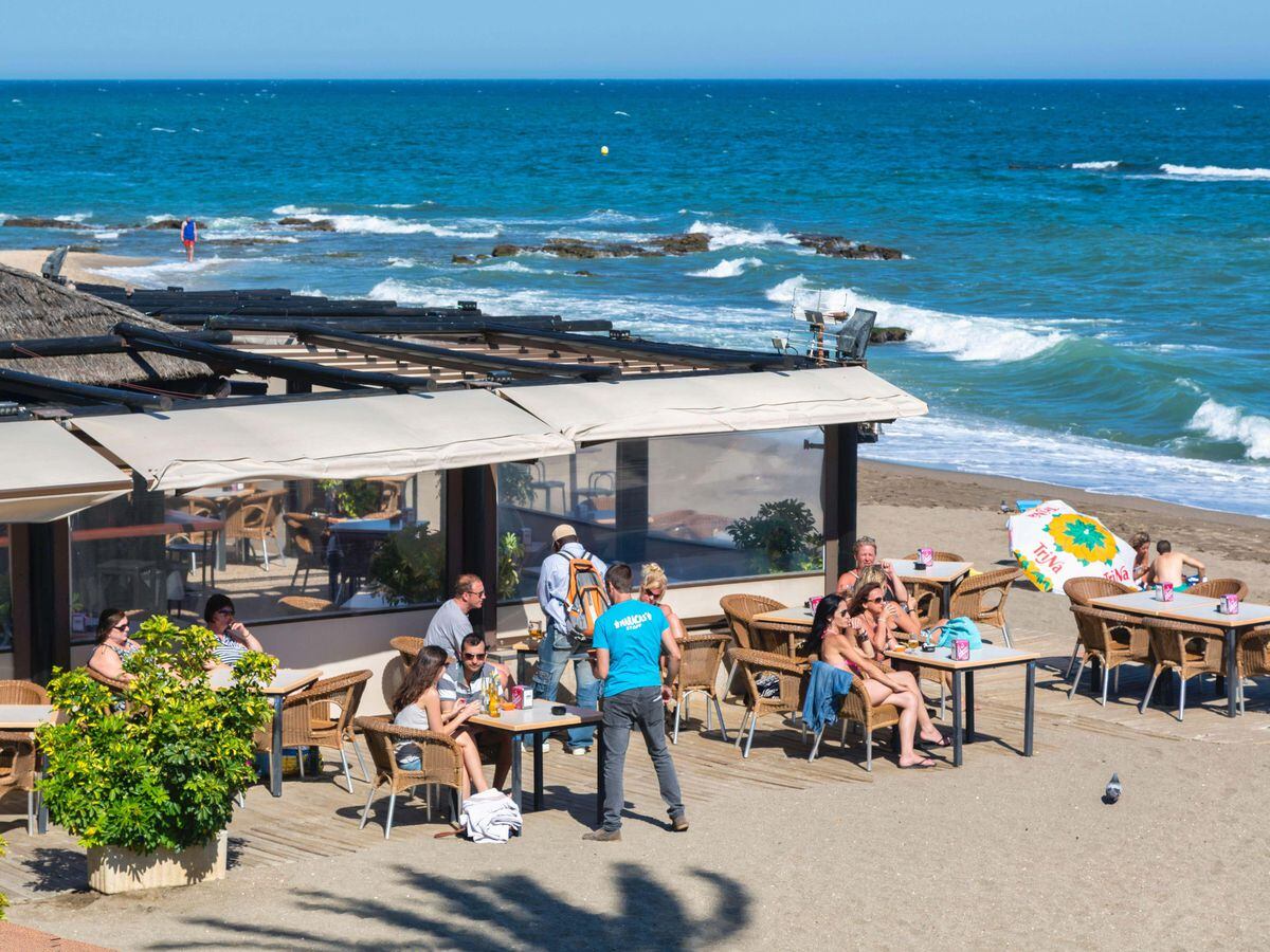 People at a beach bar in the Costa del Sol, Spain