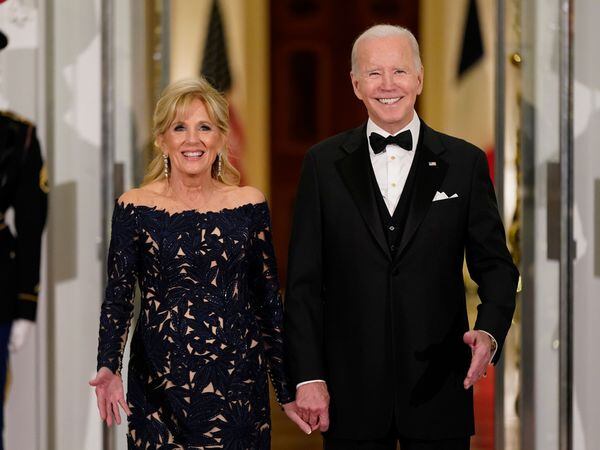 President Joe Biden and first lady Jill Biden prepare to greet French President Emmanuel Macron and his wife Brigitte Macron as they arrive for a State Dinner on the North Portico of the White House in Washington, Thursday, Dec. 1, 2022.