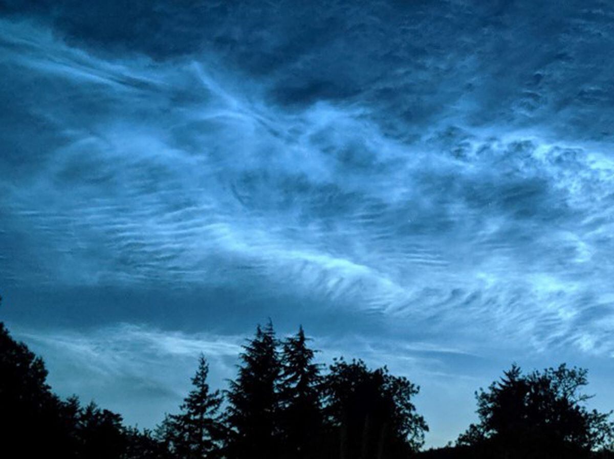 Noctilucent clouds, a spectacular phenomenon of the summer twilight sky.