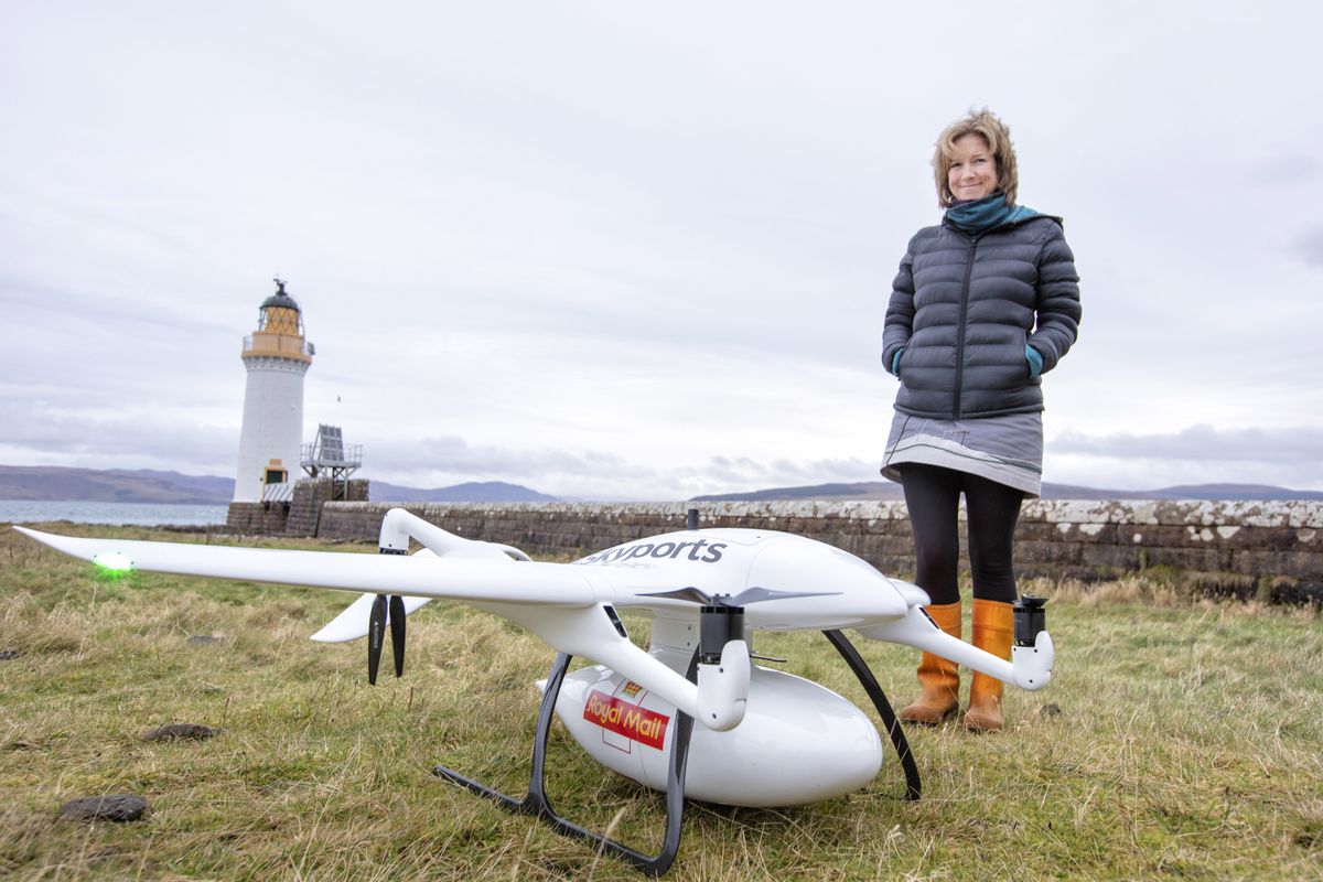 Isle of Mull lighthouse keeper Alex Kershaw with the Royal Mail Skyports drone. Picture: Chris Gorman/Royal Mail