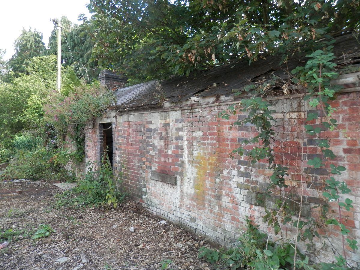 The crumbling weighbridge office is one of the last vestiges of the vanished Bishop's Castle Railway line