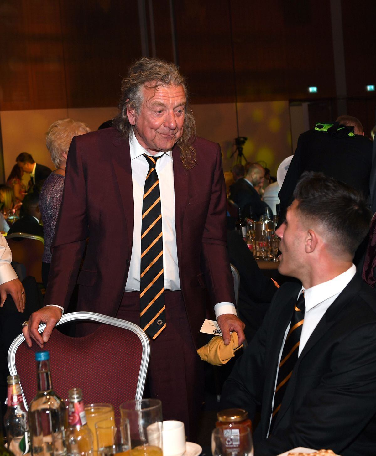 Robert Plant speaks with Danny Batth of Wolverhampton Wanderers
