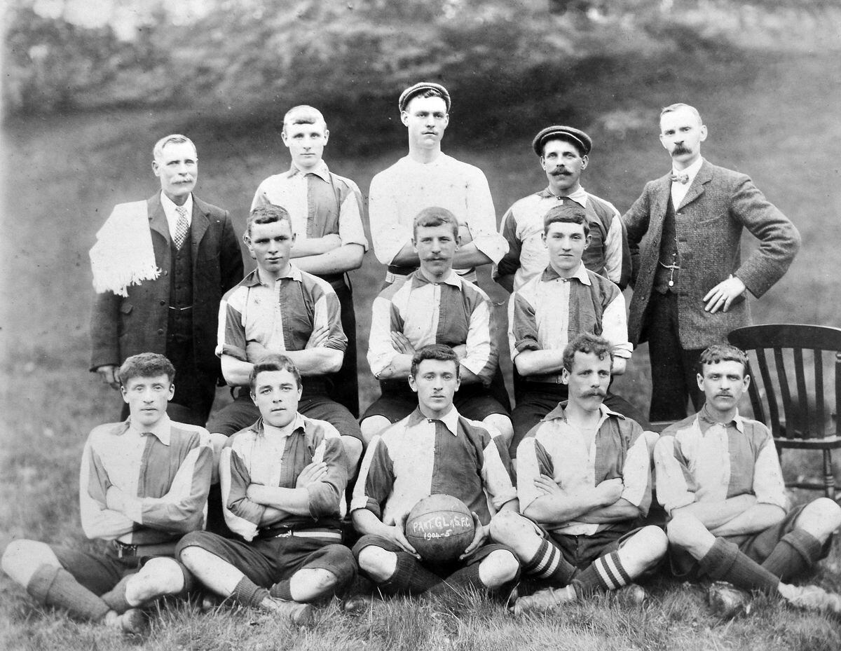 "Pant Glas FC, 1904-5" is helpfully written on the football in this team lineup. There are no cups on display, as there surely would have been had they won any, but maybe it's the start of the season and they are yet to come. Pant Glas is between Oswestry and Selattyn. 