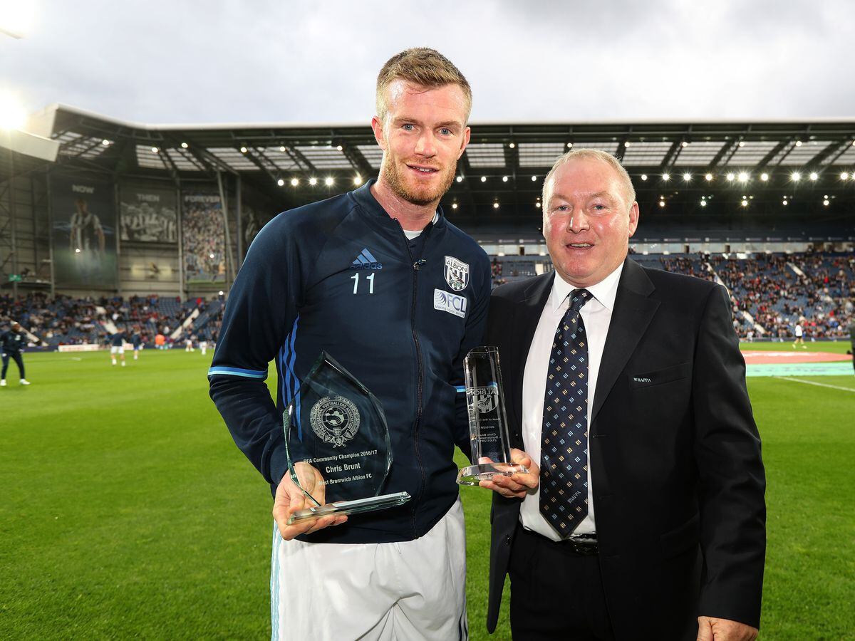 Former West Bromwich Albion player Derek Statham presents trophies to Chris Brunt of West Bromwich Albion (AMA)
