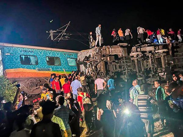 Rescuers work at the site of passenger trains that derailed in Balasore district, in the eastern Indian state of Orissa, Friday, June 2, 2023. Two passenger trains derailed in India, killing at least 13 people and trapping hundreds of others inside more than a dozen damaged coaches, officials said. About 400 people were injured and taken to hospitals, and the cause of the accident was under investigation, officials said