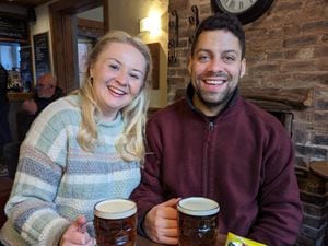 Josh and Charlotte enjoying a pint as they visit every pub in Shropshire
