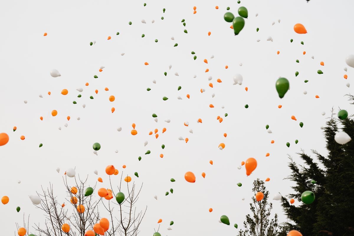 Hundreds of balloons were released