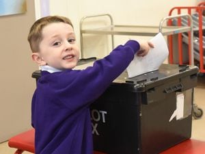 St Giles Primary School pupil Arthur Daws, aged 5, casts his vote