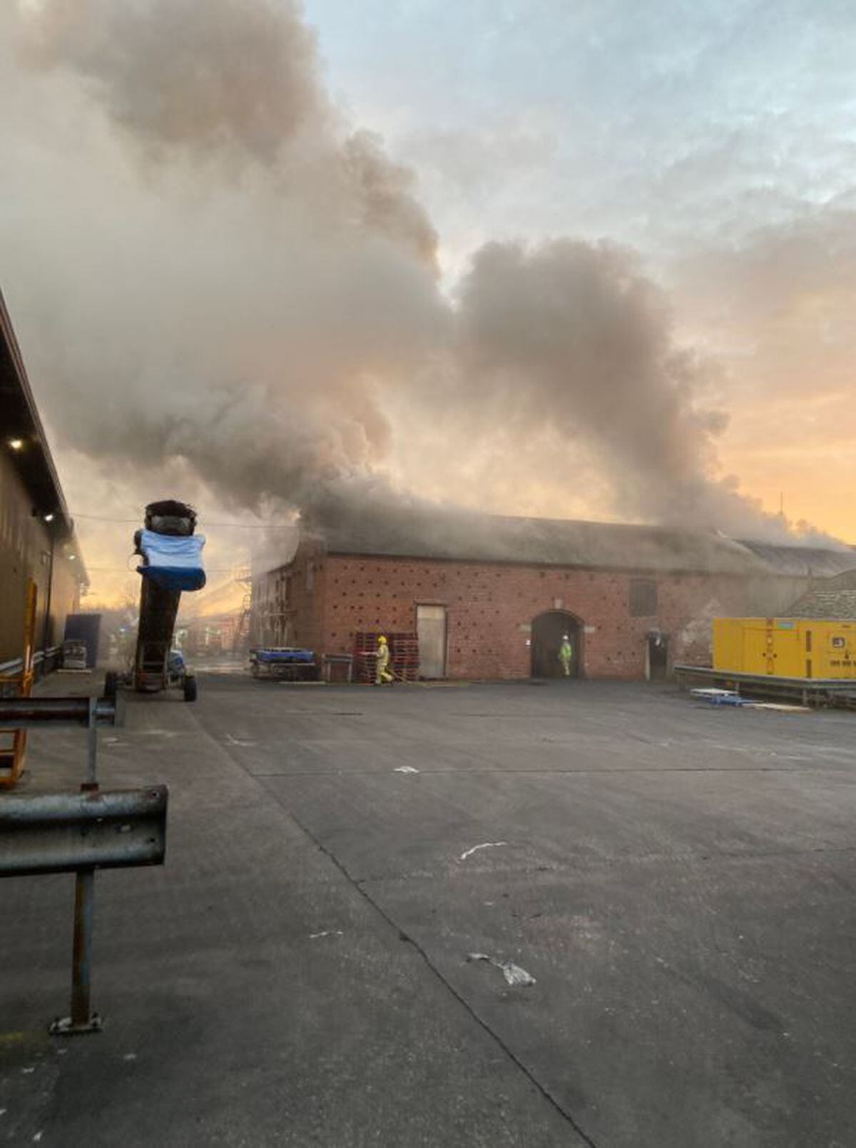 Dramatic pictures show smoke billowing through the roof at CJ Wildlife. Pictures: Shropshire Fire and Rescue Service