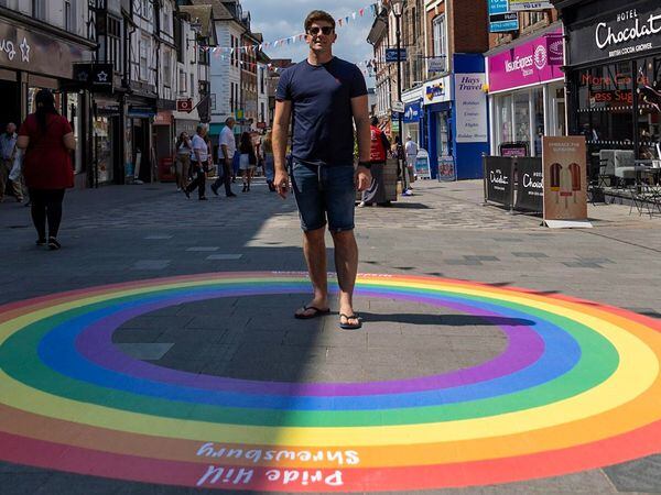 Simon Perks, owner of Christmas Perks in Wyle Cop and member of Shrewsbury BID board, takes a look at the rainbow on Pride Hill.